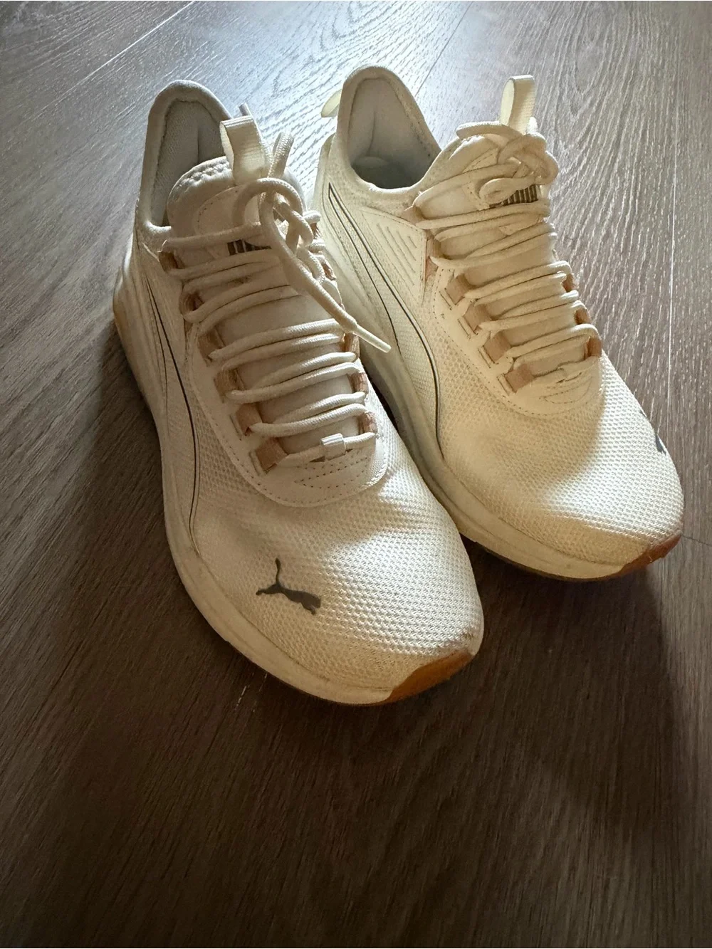 Puma women’s Off-White Cream Athletic Sneakers
